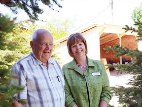 John Sinnott (left) and Millie Loeffler (right) enjoy the shade from the new Colardo Blue Spruce trees in Tranquility Park at Crestview Lodge in Pincher Creek. John Stoesser/Pincher Creek Echo.