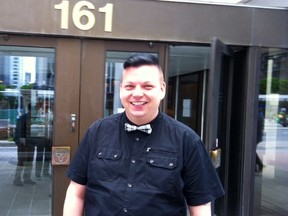 Elliott Youden smiles outside the Ottawa courthouse last summer. TONY SPEARS/Ottawa Sun/QMI Agency)