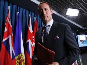 Justice Minister Peter MacKay leaves at the conclusion of a news conference on Parliament Hill in Ottawa June 4, 2014.   REUTERS/Chris Wattie