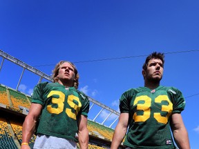 Curtis Dublanko, right, and Curtis Sharun grew up playing football together in Leduc and have been reunited as Eskimos teammates. (Perry Mah, Edmonton Sun)