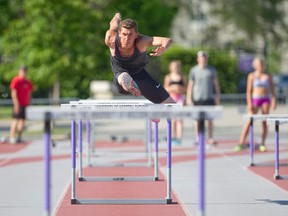 Central secondary?s Locky Butcher, a favourite in the hurdles at OFSAA this year, practises at TD Stadium in London. (CRAIG GLOVER / The London Free Press)