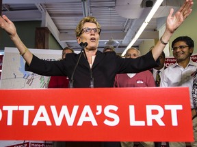 Kathleen Wynne was in Ottawa on Wednesday promising help to clean up the Ottawa River and cash for transit. Errol McGihon/Ottawa Sun