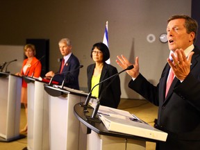 John Tory speaks during a mayoral debate at Humber College in Toronto on Wednesday June 4, 2014. (Dave Abel/Toronto Sun)