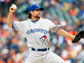 Toronto Blue Jays starting pitcher R.A. Dickey throws against the Detroit Tigers at Comerica Park in Detroit, June 4, 2014. (RICK OSENTOSKI/USA Today)