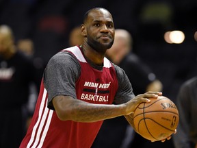 Miami Heat forward LeBron James shoots the ball during practice before Game 1 of the 2014 NBA Finals against the San Antonia Spurs. (Bob Donnan-USA TODAY Sports)
