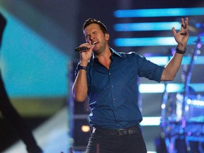 Luke Bryan performs "Play It Again" during the 2014 CMT Music Awards in Nashville, Tennessee June 4, 2014. (REUTERS/Harrison McClary)