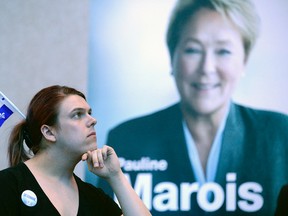 Supporter of the Parti Quebecois looks disappointed at the announcement of the defeat of the PQ as she looks at results of elections on giant screens in the Westin hotel in Montreal, Monday, April 7, 2014.

(DIDIER DEBUSSCHERE/QMI Agency)