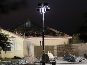 A damaged house is seen at the scene of a U.S. military jet crash in Imperial, California June 4, 2014. The jet crashed in a Southern California desert town on Wednesday, damaging homes, according to military officials and local media. The AV-8B Harrier jet from the Marine Corps Air Station in Yuma, Arizona, crashed at about 4:20 p.m. local time in Imperial, California, said Corporal Melissa Lee of the San-Diego based Marine Corps Air Station Miramar. (REUTERS/Sandy Huffaker)