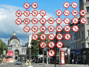 Most roads signs in Europe are easier to figure out than this confusing assortment in Antwerp. (photo: Rick Steves)