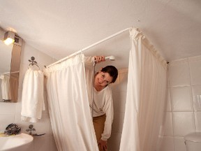 Wielding a handheld shower in a tight shower that lacks a soap dish or shelf may lead to some bathroom gymnastics. (photo: Dominic Bonuccelli)