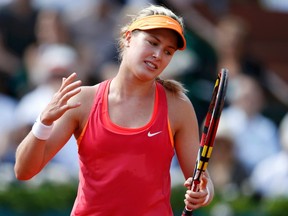 Eugenie Bouchard of Canada reacts during her women's semi-final match against Maria Sharapova of Russia at the French Open tennis tournament at the Roland Garros stadium in Paris June 5, 2014.  (REUTERS)