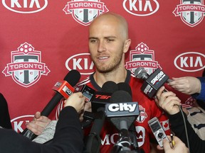 Toronto FC midfielder Michael Bradley answers questions from reporters during media day at the Kia training grounds on February 11, 2014 in Toronto.  (Tom Szczerbowski/Getty Images/AFP)