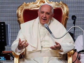 Pope Francis talks during a meeting of the Renewal of the Holy Spirit organization at the Olympic stadium in Rome June 1, 2014. REUTERS/Giampiero Sposito