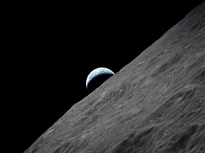 The crescent Earth rises above the lunar horizon in this undated NASA handout photograph taken from the Apollo 17 spacecraft in lunar orbit during the final lunar landing mission in the Apollo program. December 13, 2012 marks the 50th anniversary of the last manned lunar trip. (REUTERS/NASA/Handout)