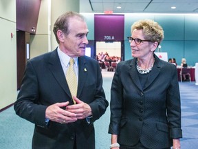 Premier Kathleen Wynne with Deputy Mayor Norm Kelly after both spoke at the Canadian Club of Toronto at the Metro Toronto Convention Centre in Toronto June 5, 2014. Kelly gave his endorsement to Wynne. (Ernest Doroszuk/Toronto Sun)