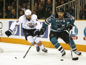 Dan Boyle's days with the San Jose Sharks are officially over as the team traded his rights to the New York Islanders. (QMI Agency)