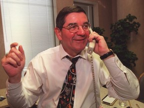 Hartley Steward answering calls from readers during his time as Toronto Sun publisher. Steward died on June 5, 2014. (Toronto Sun file photo)