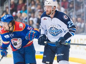 Sarnia-born defenceman Jordan Hill (in white) will be taking on good friend and fellow Sarnia native Dustin Jeffrey when the St. John's IceCaps and the Texas Stars square off for the AHL's Calder Cup in the championship series on Sunday, June 8. Photo courtesy of Colin Peddle/St. John’s IceCaps.