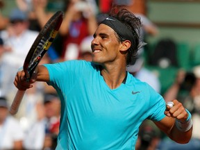 Rafael Nadal reacts after winning his semifinal match with Andy Murray during the French Open at Roland Garros stadium in Paris June 6, 2014. (REUTERS/Gonzalo Fuentes)