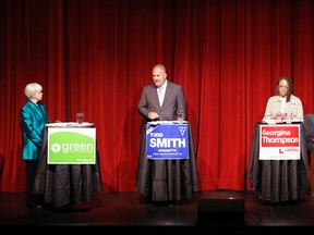 The Belleville Chamber of Commerce provincial candidates debate at The Empire Theatre in downtown Belleville Thursday evening, June 5, 2014 features, from left, in the green corner Anita Payne of the Green Party, in the blue corner is Progressive Conservatives incumbent Todd Smith, in the red corner is Liberal candidate Georgina Thompson and Merrill Stewart of the New Democrat Party stands in the orange corner. - Jerome Lessard/The Intelligencer/QMI Agency