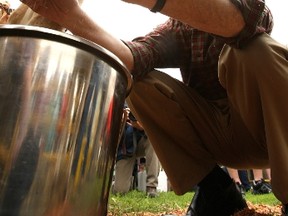 Mayor Jim Watson was the first "celebrity milker" at the annual Food Aid Day Friday morning at City Hall. The event raises funds to purchase cows from local farmers which are used to donate ground beef to the Ottawa Food Bank. DOUG HEMPSTEAD / Ottawa Sun