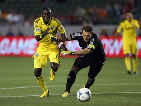 The Reds acquired striker Dominic Oduro (left) from the Columbus Crew on Friday, sending Alvaro Rey the other way. (GETTY IMAGES)