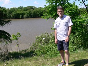 Coun. Brian Mayes (St. Vital) stands by the banks of the Red River at Guay Park in St. Vital on Saturday, June 7, 2014. Mayes announced that $1.6 million has been set aside to help stabilize the riverbank at Guay Park with work expected to begin January 2015. (GLEN DAWKINS/Winnipeg Sun)
