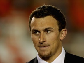 Quarterback Johnny Manziel of Texas A&M on the sideline during the 2014 Vizio BCS National Championship Game at the Rose Bowl on January 6, 2014. (Jeff Gross/Getty Images/AFP)