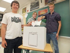 From left to right: Northern Collegiate grade 10 students Brock Morgan, Kelly Manning and Cody Smith will be casting votes in a simulation of the provincial election. Their school is one of roughly 1,600 hundred taking part across the province. BRENT BOLES / THE OBSERVER / QMI AGENCY​