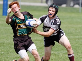 Centennial Secondary School Chargers (green) face Stratford Northwestern Secondary School in junior boys action at the 2014 Barbarian Cup at M. A. Sills Park in Belleville, Ont. Sunday, June 8, 2014. - Jerome Lessard/The Intelligencer/QMI Agency
