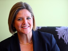 New Democratic Leader Andrea Horwath sits down for tea with Christina Blizzard at Majisteas tea room in Toronto Friday June 6, 2014. (Dave Abel/Toronto Sun)