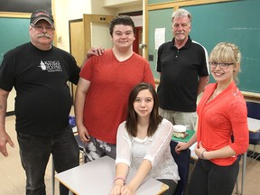 QECVI teacher Bob Cussler, left, who wrote a play based on the closure of QE and KCVI, stands with participants Bryen MacDonald, Bill Perry, Desiree Simpson and, front, Chelsea McGee. MICHAEL LEA\THE WHIG-STANDARD