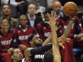 Miami Heat’s LeBron James goes up for two of his 35 points during Game 2 against the Spurs in San Antonio on Sunday night. (Reuters)