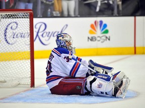 Rangers goaltender Henrik Lundqvist is stunned after allowing the game-winning goal in double-overtime against the Kings on Saturday night. (Gary A. Vasquez/USA Today Sports)