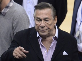 This April 21, 2014 file photo shows Los Angeles Clippers owner Donald Sterling attending the NBA playoff game between the Clippers and the Golden State Warriors at Staples Center. (AFP PHOTO/Files/ ROBYN BECK)