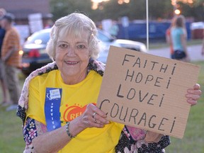 Shirley Crockett holds her inspirational sign during Friday's 13th annual Tillsonburg Relay for Life. CHRIS ABBOTT/TILLSONBURG NEWS