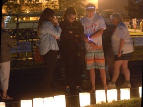 Whether in memory or in honour, the lighting of the luminaries is an emotional time at the Tillsonburg Relay for Life. CHRIS ABBOTT/TILLSONBURG NEWS