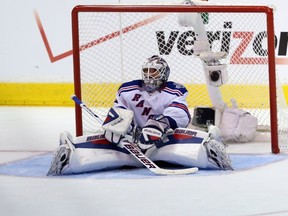 Goaltender Henrik Lundqvist #30 of the New York Rangers sits on the ice after allowing the game winning goal in double overtimeduring Game 2 of the Stanley Cup final at the Staples Center on June 7, 2014. (Victor Decolongon/Getty Images/AFP)