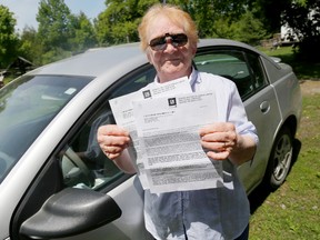 Anne MacInnes holds letters sent to her from General Motors regarding the faulty ignition switch her in  Saturn Ion. The car is just one of more than two million recalled by the car company, but vehicle owners are still waiting for the replacement parts. 
Emily Mountney/The Intelligencer