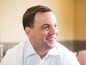 PC Leader Tim Hudak speaks with Christina Blizzard during a campaign stop in St. Catharines on June. 8.  (BOB TYMCZYSZYN, QMI Agency)