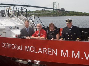Minister of Justice Peter MacKay, Alan and Joanne McLaren and Commanding Officer Garth Sveinson at the naming and dedication service ceremony for the Canadian Coastguard Service Corporal McLaren MMV took place in Dartmouth, Nova Scotia on Monday, June 9, 2014. 
Pete Fisher Photography