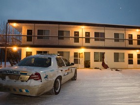 FILE: A broken room window is seen at the Red Rest Motel in Redwater, Alta., on Dec. 25, 2012. RCMP officers were involved in an armed standoff at the motel, which involved tactical units as well as uniformed officers. Ian Kucerak/Edmonton Sun