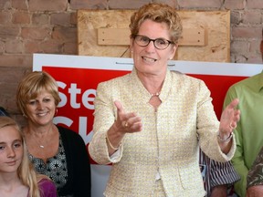 Liberal Leader Kathleen Wynne speaks to supporters during her campaign stop in Stratford Monday, June 9, 2014. (Scott Wishart/QMI Agency)