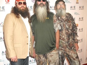 "Duck Dynasty" stars Willie Robertson, left, Phil Robertson, middle, and Si Robertson. (Mr. Blue/WENN.COM)