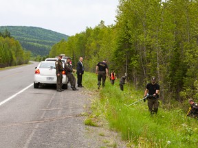 Two bodies were found in a stolen vehicle, Monday, June 9, 2014, in the Matapedia Valley, near Routhierville in the Bas-Saint-Laurent. (MARIE-CLAUDE HAMEL / QMI AGENCY)