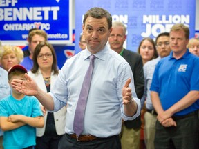 Ontario PC leader Tim Hudak talks to supporters gathered at London West PC candidate Jeff Bennett's campaign office in London, Ontario on Tuesday June 10, 2014.
(CRAIG GLOVER, The London Free Press)