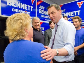 Ontario PC leader Tim Hudak talks to supporters gathered at London West PC candidate Jeff Bennett's campaign office in London, Ontario on Tuesday June 10, 2014. (CRAIG GLOVER, The London Free Press)