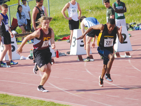 Gage Foster of PCI, left, focuses on getting out to a good start in a 100-metre race at MHSAA provincials in June. (Connie Bromley/submitted photo)