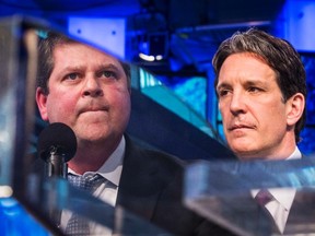 Maple Leafs' Dave Nonis (left) says he has definitely been fielding more calls with the GM meetings starting Wednesday. (Mark Blinch/Reuters)