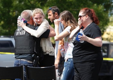 Parents and students are reunited after a shooting at Reynolds High School in Troutdale, Oregon June 10,  2014.  REUTERS/Steve Dipaola